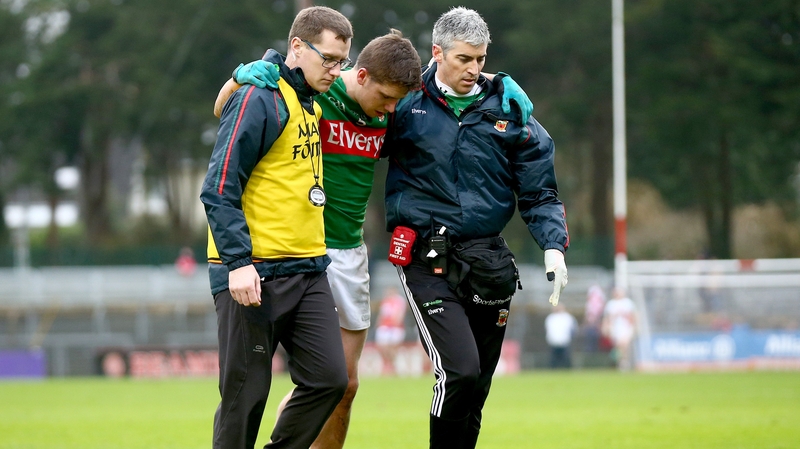 Lee Keegan is helped from he field against Cork