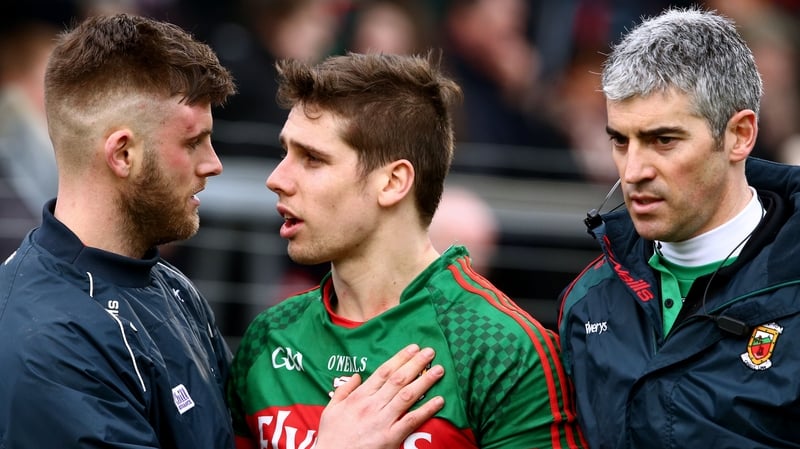 Eoin Cadogan checks on Lee Keegan after the game