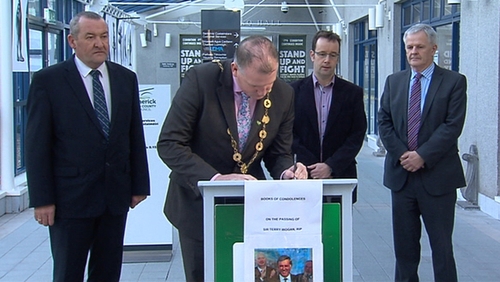 Limerick City Mayor Liam Galvin signs a book of condolence