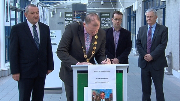 Limerick City Mayor Liam Galvin signs a book of condolence
