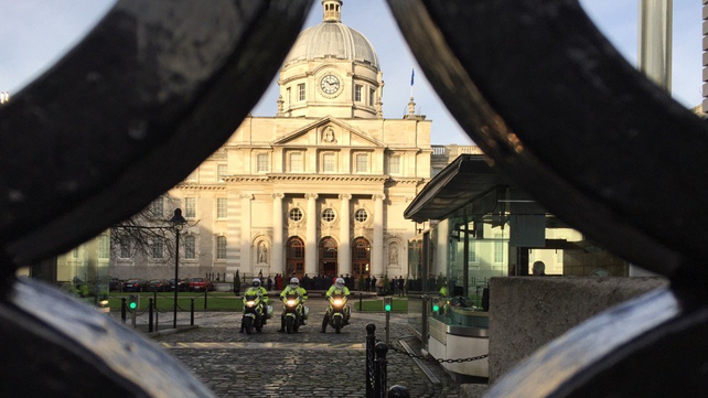 A Garda motorcycle patrol waits at Govt Buildings to escort the Taoiseach to Phoenix Park