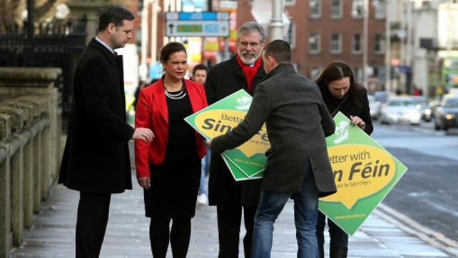 The battle begins: Gerry Adams and other leading Sinn Féin candidates prepare to meet the media