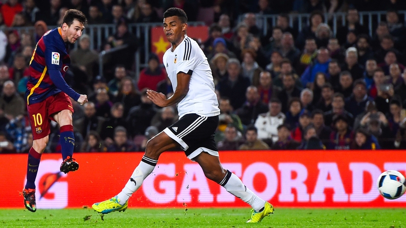 Leo Messi fires home the fifth against Valencia