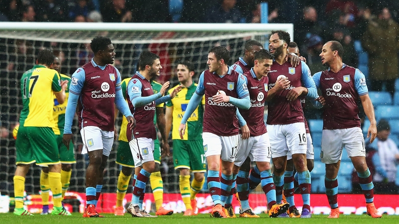 Aston Villa's players celebrate Joleon Lescott's opener