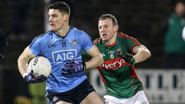 Diarmuid Connolly of Dublin evades Mayo's Colm Boyle