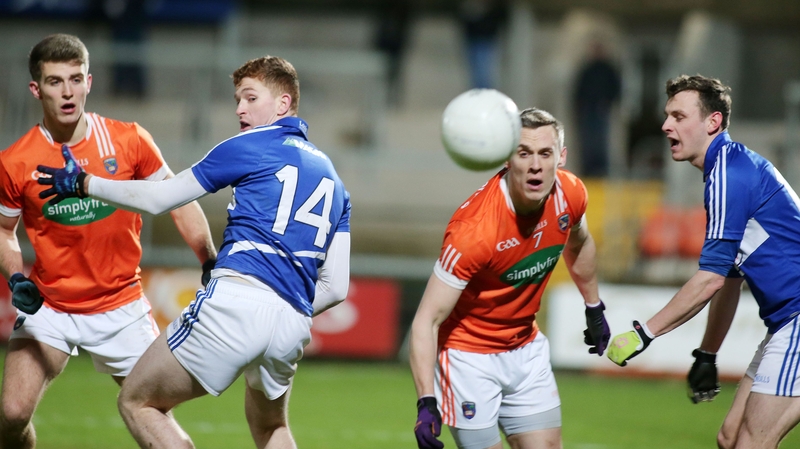 Armagh's Shea Heffron and Mark Shields with Laois' Evan O'Carroll and Matthew Campion