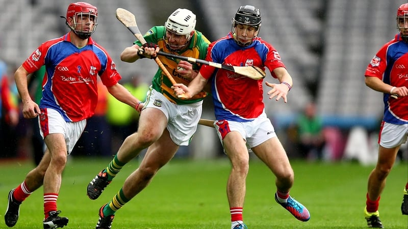 Abbeyknockmoy's Damien Rooney clashes with Brian Lannon of Bennettsbridge