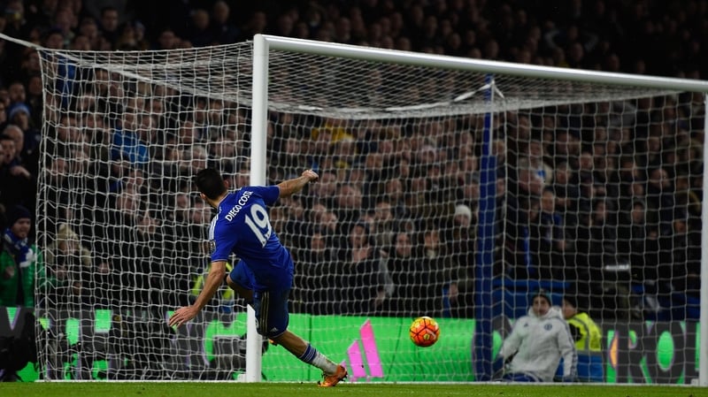 Diego Costa slides home at the second attempt to earn Chelsea a draw