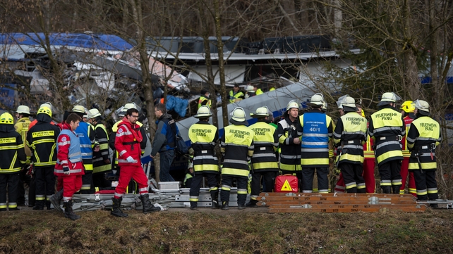 Rescue teams work at the site of the crash