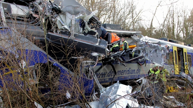 Rescue workers sift through the wreckage