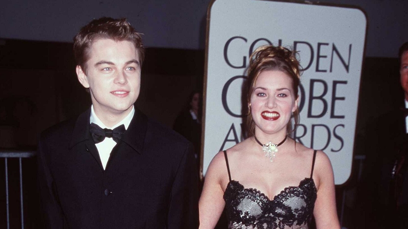 Leonardo DiCaprio arrives with co-star Kate Winslet for the 55th Annual Golden Globe Awards in 1998