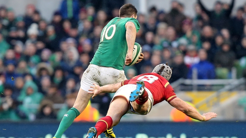 Johnny Sexton makes a break against Wales