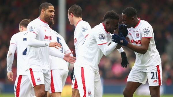 Giannelli Imbula (R) of Stoke City celebrates scoring his team's first goal with his team mates