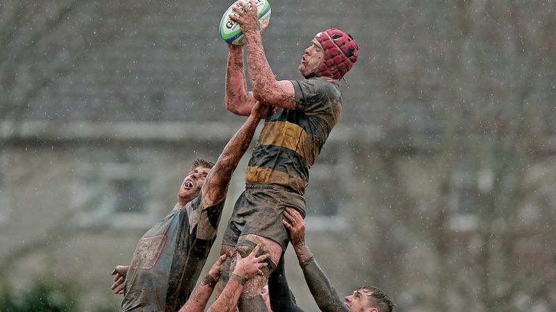Sean Duggan of Young Munster rises above Dave Nolan of Galwegians