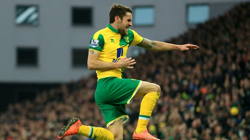 Robbie Brady celebrates his goal for the Canaries