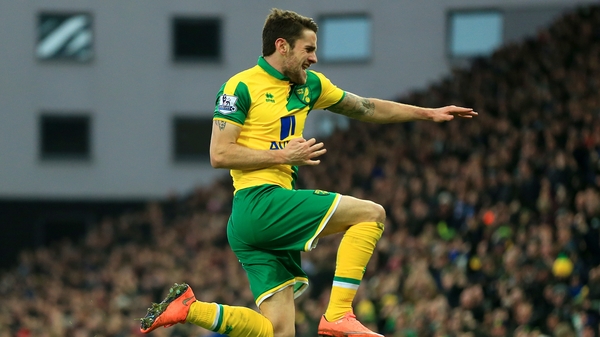 Robbie Brady celebrates his goal for the Canaries