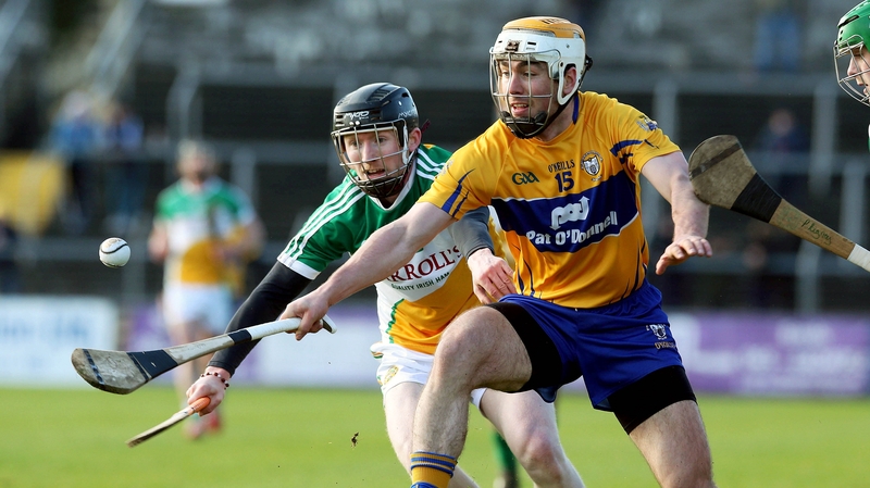 Clare's Conor McGrath and Niall Wynne of Offaly