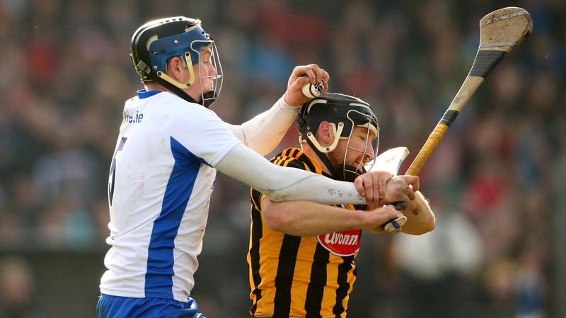 Austin Gleeson and Kilkenny's Richie Hogan battle for possession at Walsh Park