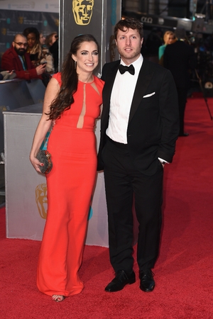 Matthew Heinemann (R) and guest