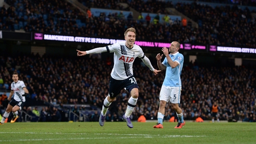 Christian Eriksen celebrates what turned out to be the winner
