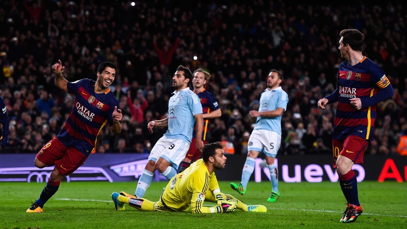 Luis Suarez rushes to Lionel Messi, who passed up the chance to net his 300th La Liga goal
