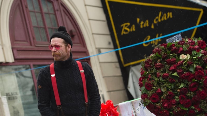 Jesse Hughes pays tribute to the victims of the Paris terrorist attacks in front of the Bataclan concert hall
