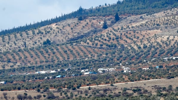 The rebel fighters were escorted across the border by Turkish forces over several nights