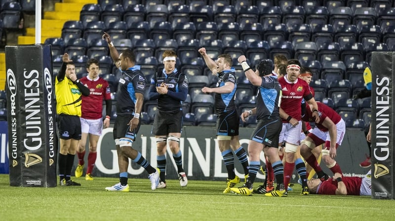 The Glasgow team celebrate at the full-time whistle