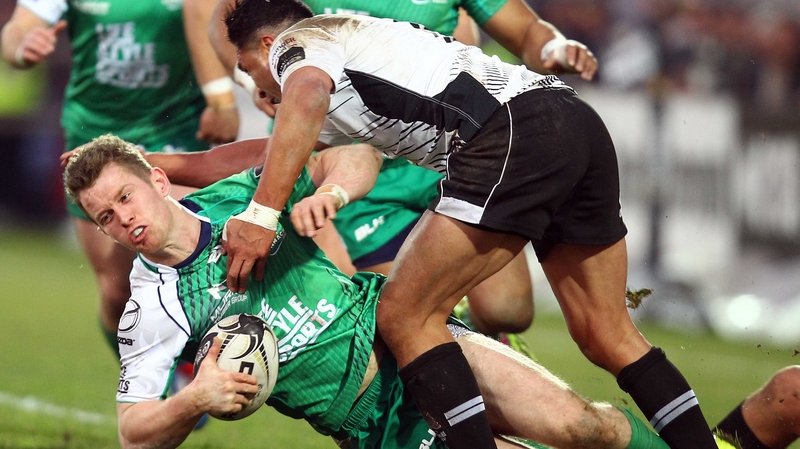 Connacht's Matt Healy squeezes over