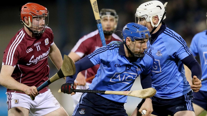 Dublin's Daire Plunkett twists away from Cathal Mannion