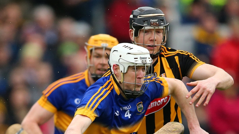 Kilkenny's Water Walsh hounds Michael Cahill for possession