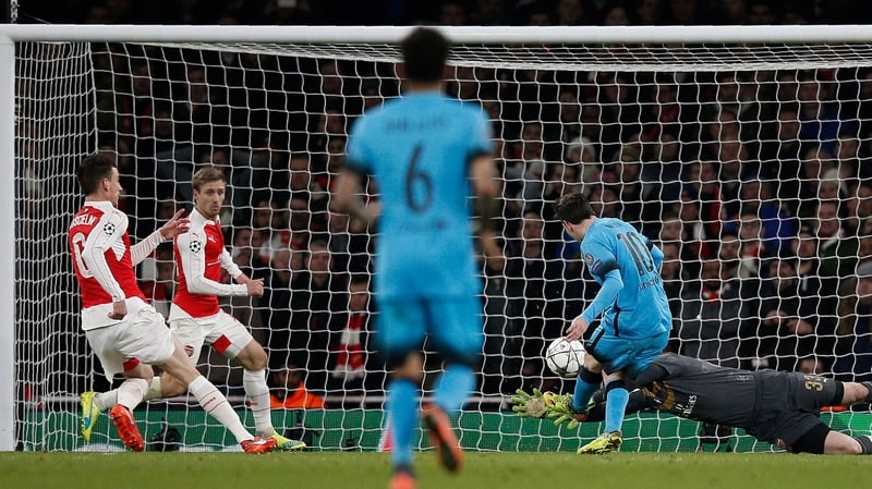 Barcelona's Argentinian forward Lionel Messi slots home the first