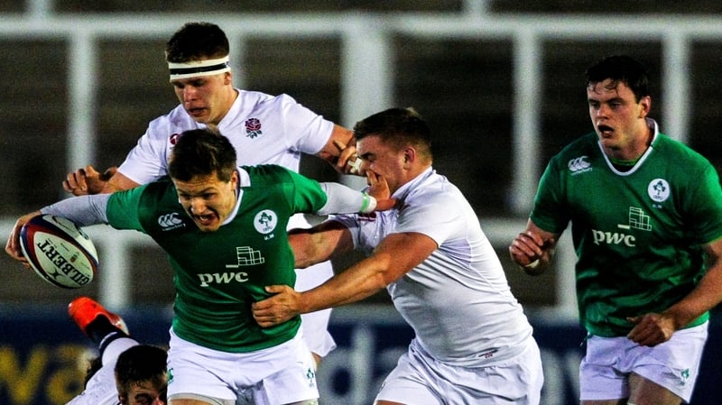 Ireland's Johnny McPhillips get's away from Jack Singleton