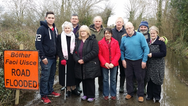 Four families still cut off by a flooded road in Offaly waiting to get a lift to vote at Mountbolus Community Centre