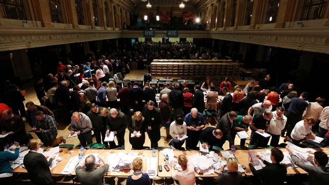 Ballot papers are verified as the count gets under way at the City Hall in Cork