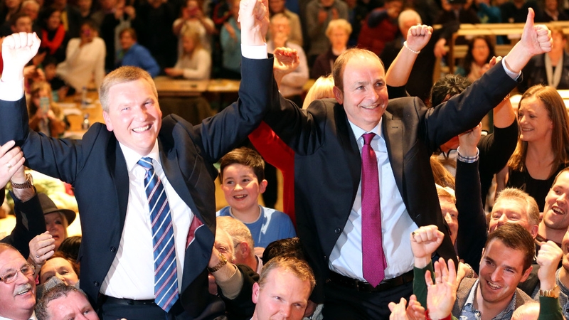 Michael McGrath and Micheál Martin celebrating their wins in Cork at the weekend