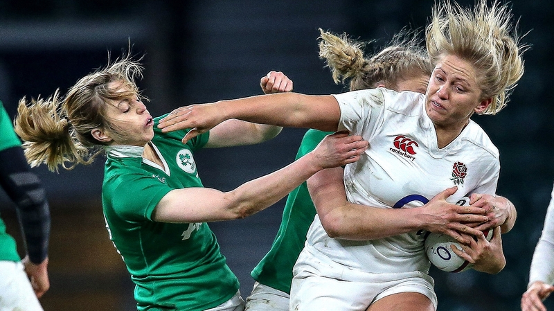 England’s Ceri Large is tackled by Ireland’s Mairead Coyne
