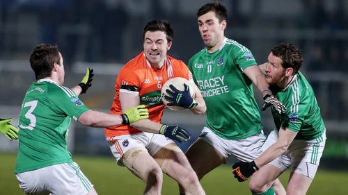 Armagh's Aidan Forker is well marshalled by Fermanagh's Che Cullen, Ryan Jones and Niall Cassidy