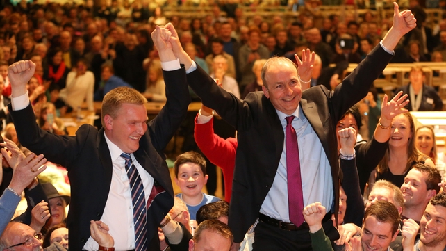 Fianna Fáil leader Micheál Martin and his party colleague Michael McGrath celebrate their election success in Cork South Central