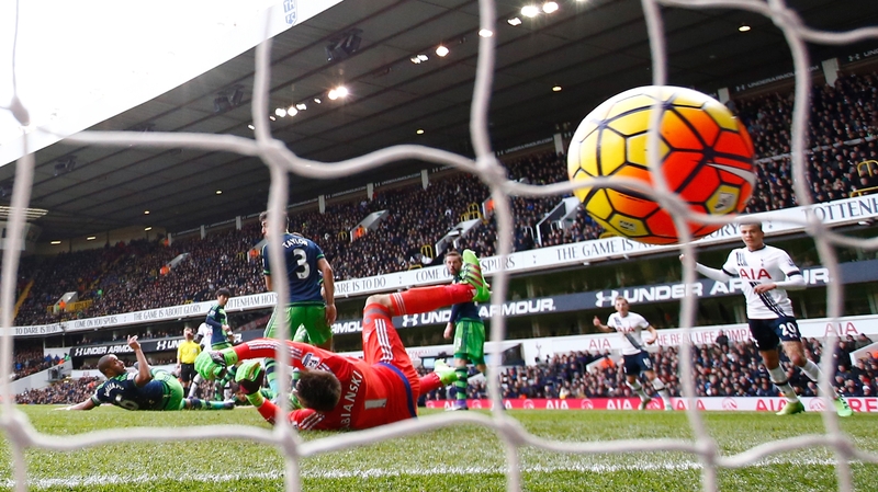 Danny Rose of Tottenham Hotspur (blocked) scores past Lukasz Fabianski
