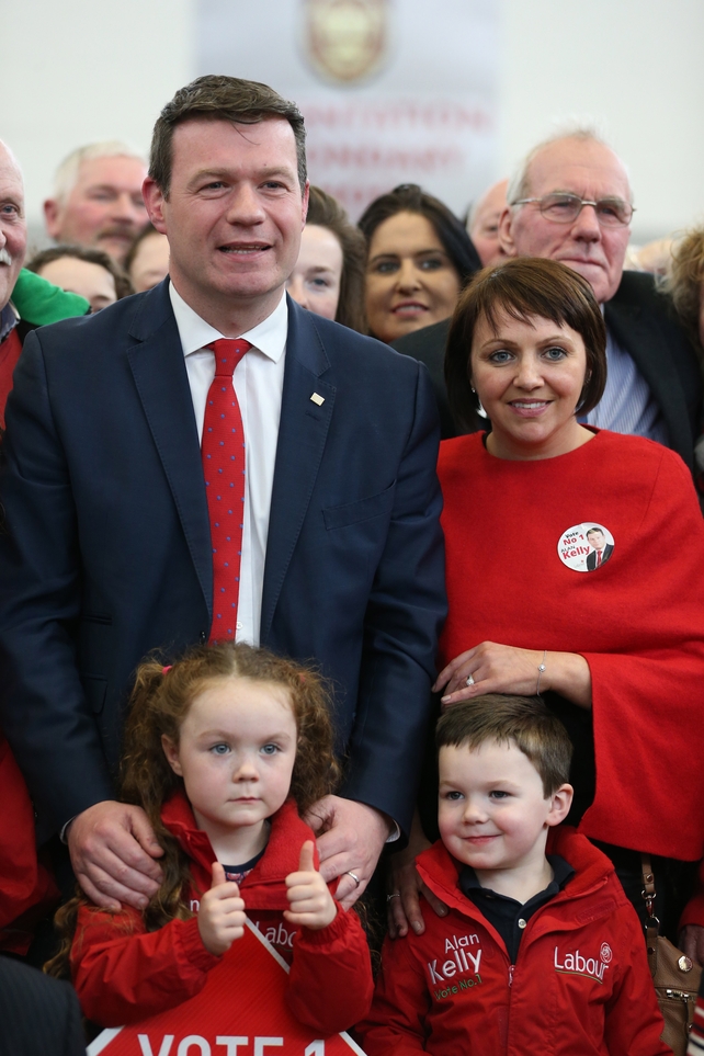 Labour's Alan Kelly with his wife Regina and children Aoibhe (left) and Senan during the count in Thurles, Tipperary