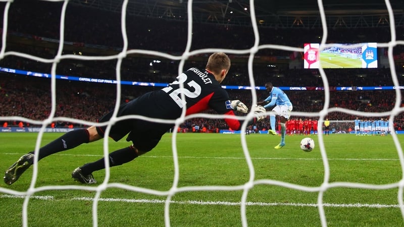 Simon Mignolet is beaten by a Yaya Toure penalty in the 2016 League Cup final