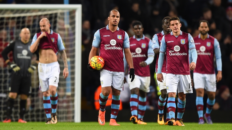 Dejected Aston Villa players after conceding against Everton