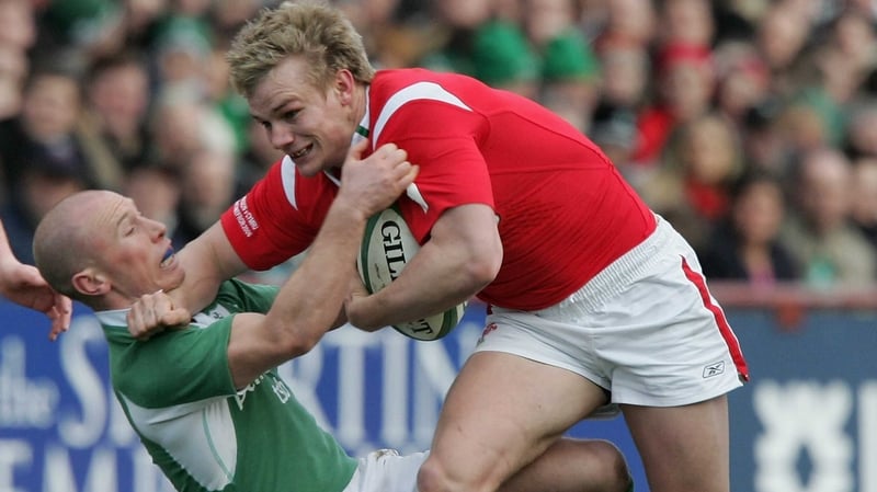 Dwayne Peel is tackled Peter Stringer during the 2006 Six Nations Championship match at Lansdowne Road