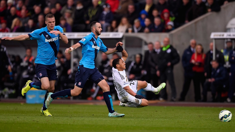 Republic of Ireland defender Marc Wilson will miss the clash with Chelsea at Stamford Bridge