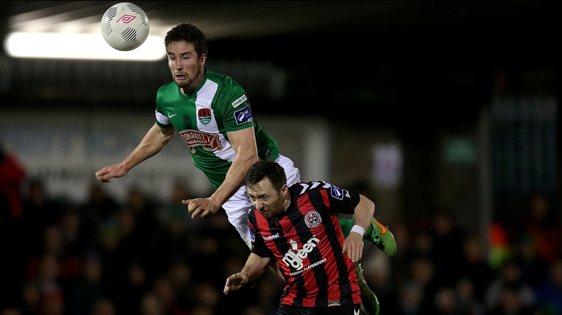 Gearoid Morrissey of Cork gets up over Bohs' Paddy Kavanagh at Turners Cross