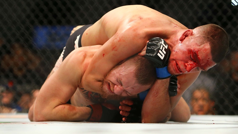 Nate Diaz applies the winning choke-hold to Conor McGregor