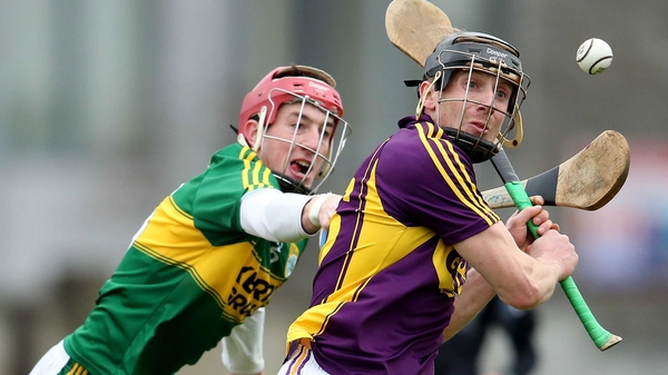 Liam Og McGovern evades Tommy Casey