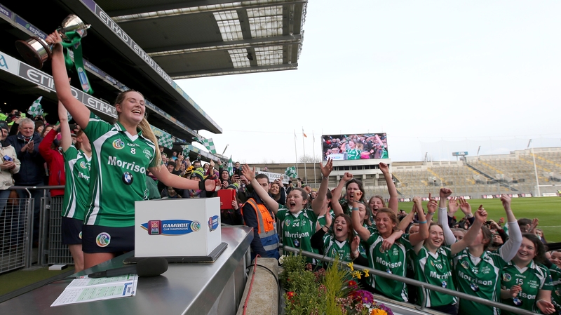 Cahir captain Aisling McCarthy with the cup on the steps of the Hogan Stand