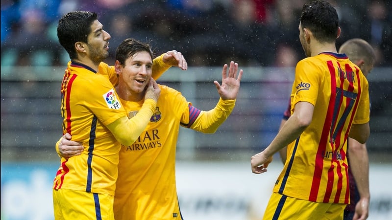 Lionel Messi celebrates with fellow goalscorers Luis Suarez and Munir El Haddadi